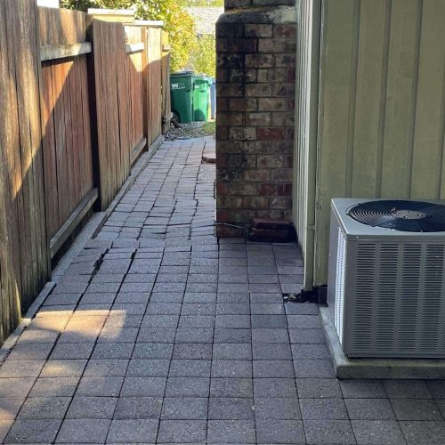 pressure washing brush prairie side yard after